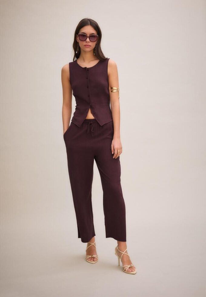 Top senza maniche abbottonato