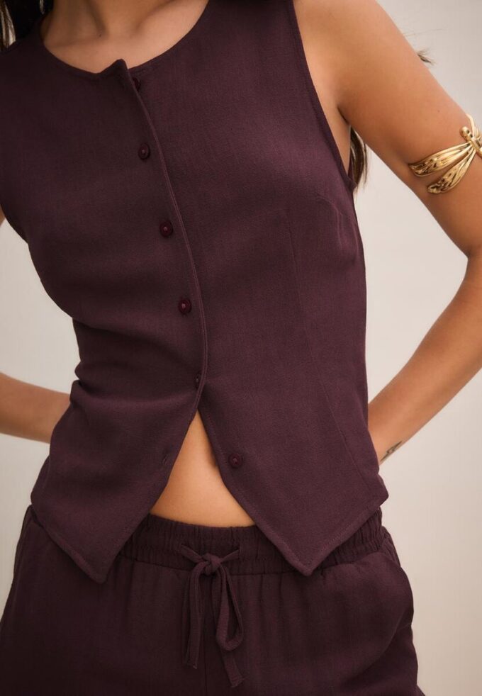 Top senza maniche abbottonato