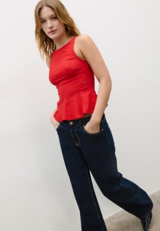 Top senza maniche con peplo