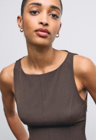 Top senza maniche con peplo