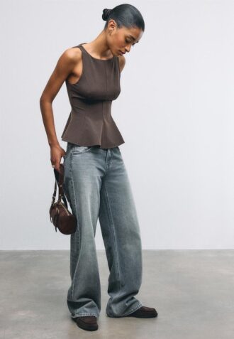 Top senza maniche con peplo