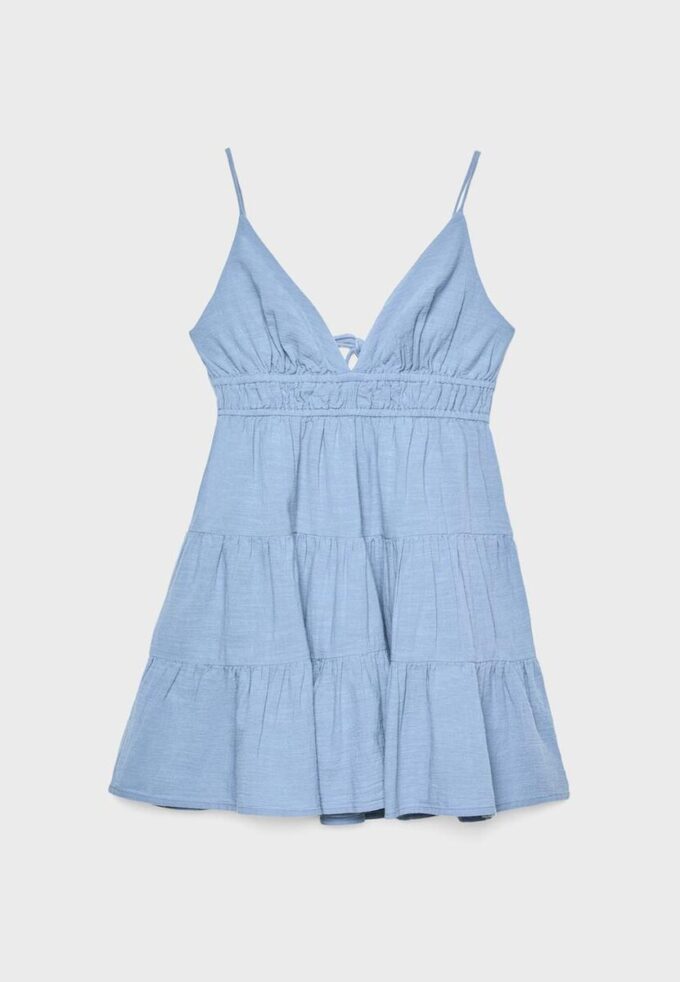 Vestito corto e fluido con dettaglio annodato sul retro