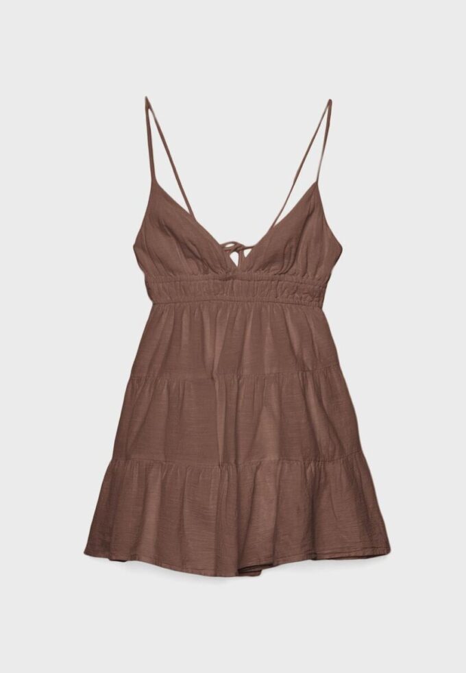 Vestito corto e fluido con dettaglio annodato sul retro