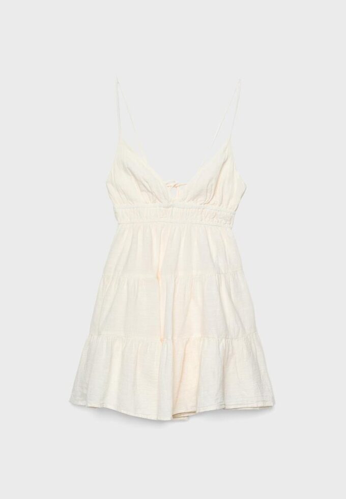 Vestito corto e fluido con dettaglio annodato sul retro