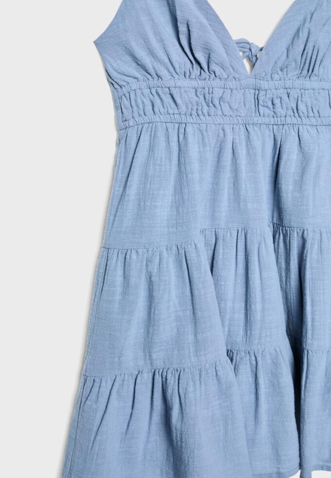 Vestito corto e fluido con dettaglio annodato sul retro