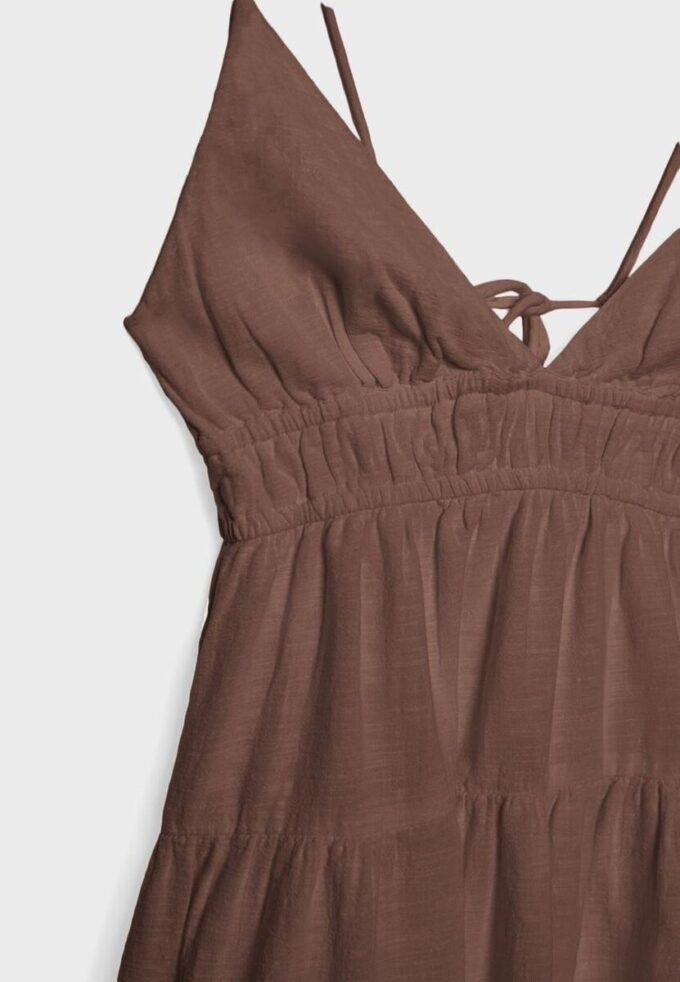 Vestito corto e fluido con dettaglio annodato sul retro