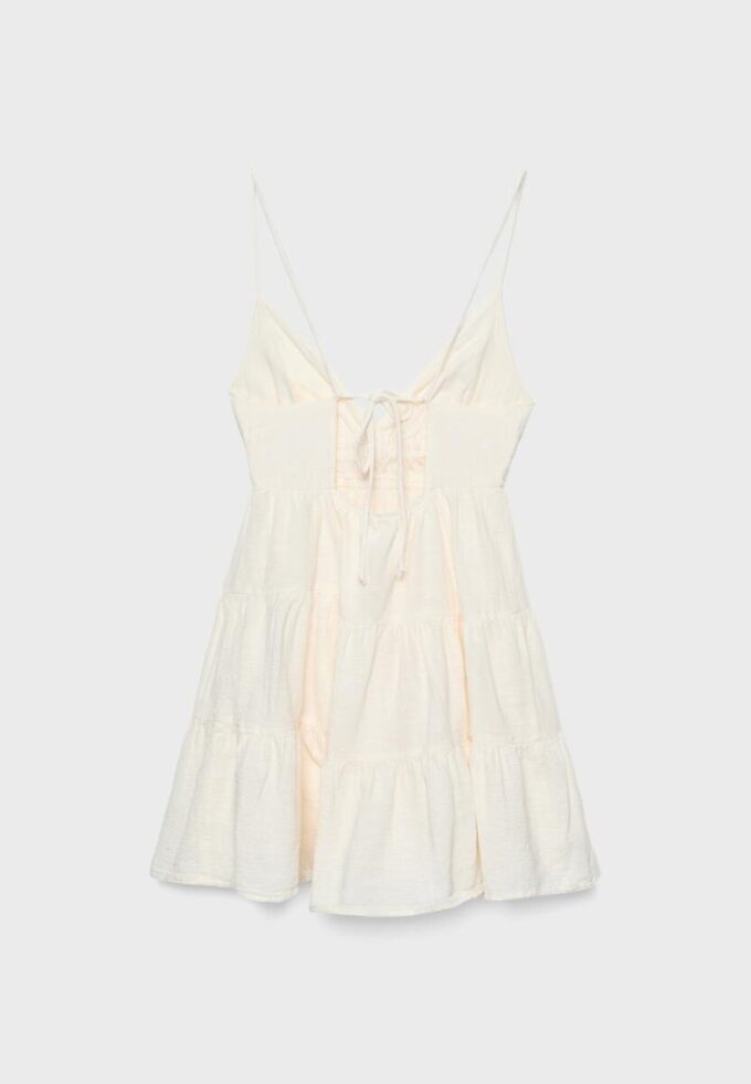 Vestito corto e fluido con dettaglio annodato sul retro