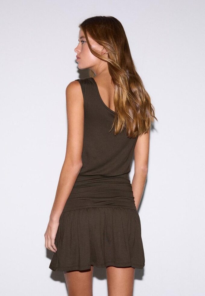 Vestito multiuso con bottoni